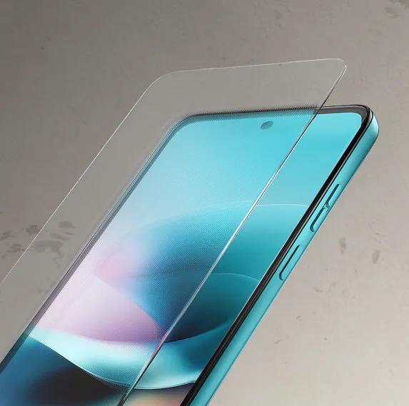 moto g67 power 5g price in india - Close-up of the aqua Motorola smartphone's display with a screen protector being applied or removed, showing its edge-to-edge screen.