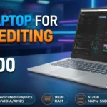 Best laptop for video editing under 50,000 with 16GB RAM, dedicated graphics, FHD display and 512GB SSD shown on a desk.